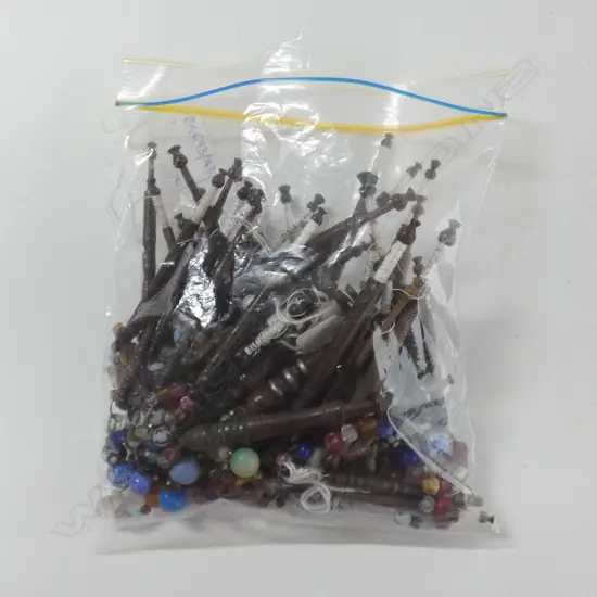 Assorted lace making wooden bobbins.